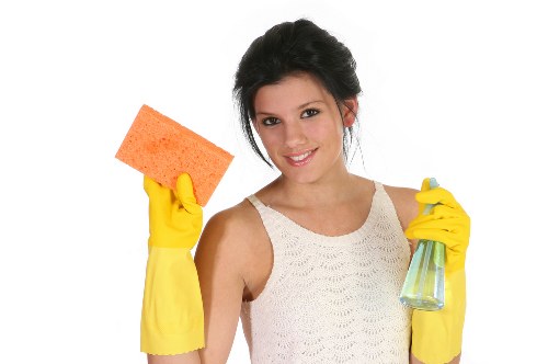Regular cleaning service for homes in Bow with a tidy living room