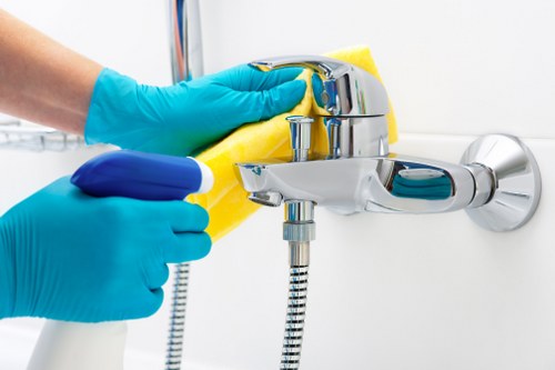 Local cleaner preparing an Airbnb flat in Bow